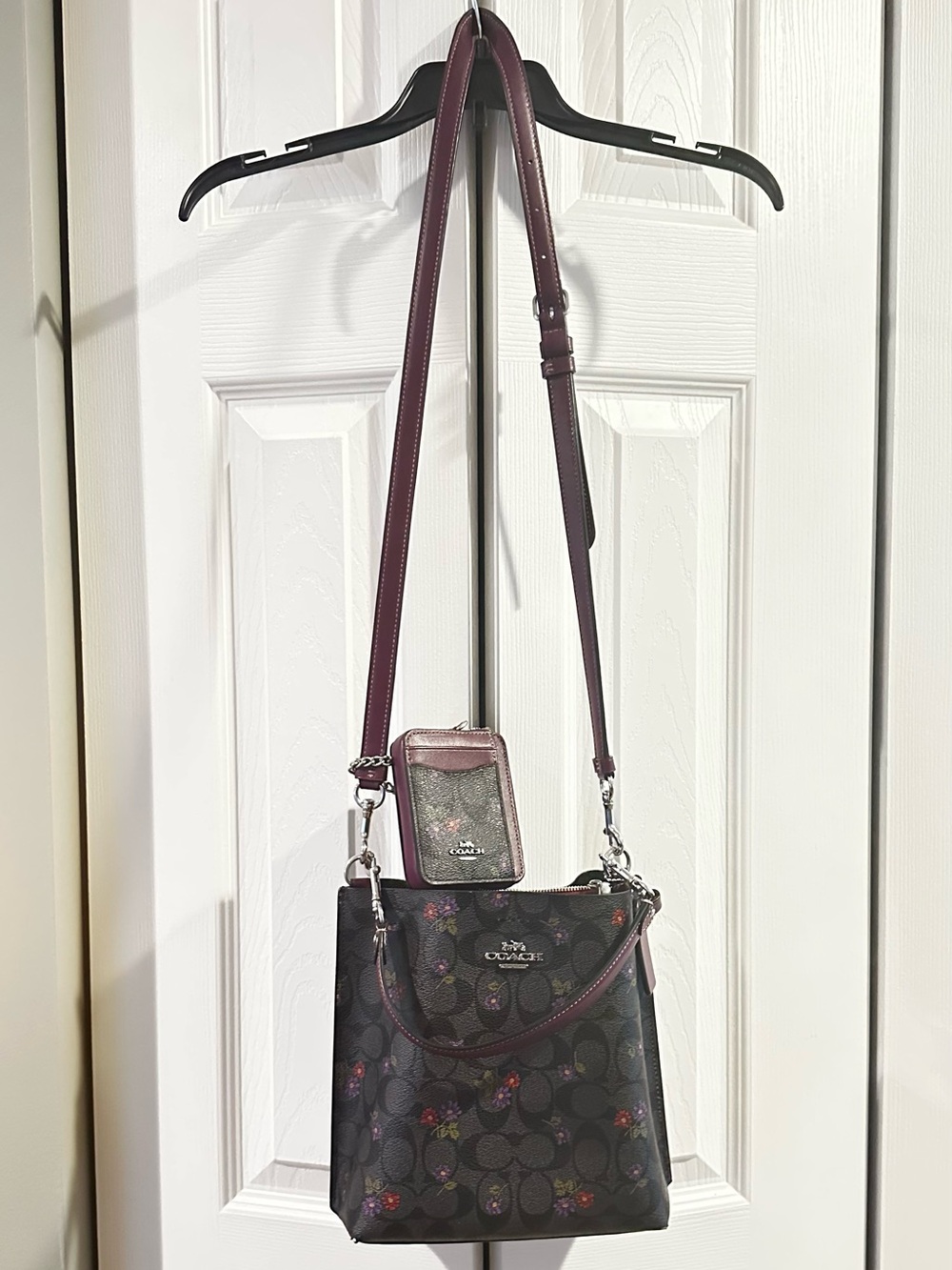 Coach Black Crossbody Bag with Plum Trim and Floral Accents